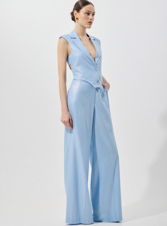 Ψηλόμεσο φαρδύ παντελόνι κοστουμιού με τσέπες και κλείσιμο με φερμουάρ στο μπροστινό μέρος.